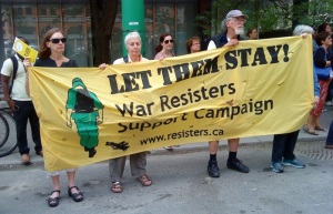 War Resisters Support Campaign at a rally to restore refugee healthcare, 2014