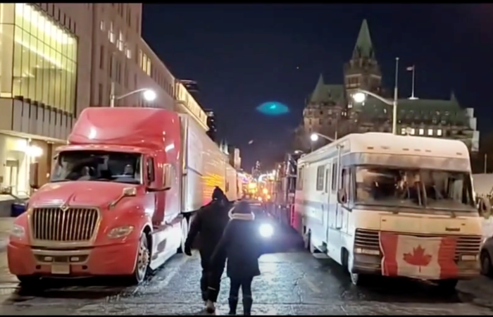 Image of two trucks that are part of the “Freedom Convoy”, Wellington Street, Ottawa, Jan. 28, 2022.
