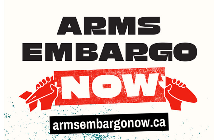 The words "Arms Embargo Now" with two hands breaking a bomb in half