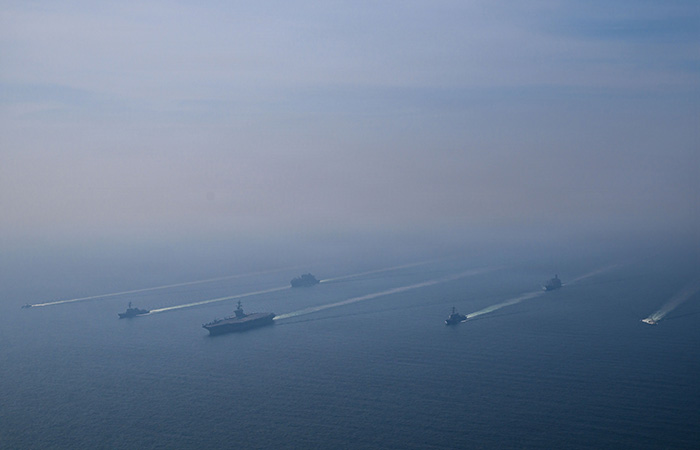 US Carrier Strike Group sails in formation in the Arabian Sea, Feb 6, 2026 Source: Jesse Monford/Wikimedia Commons